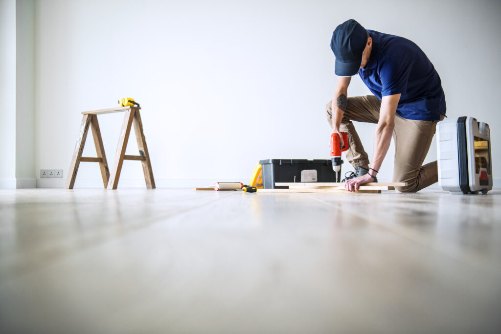 Flooring person working on a roof